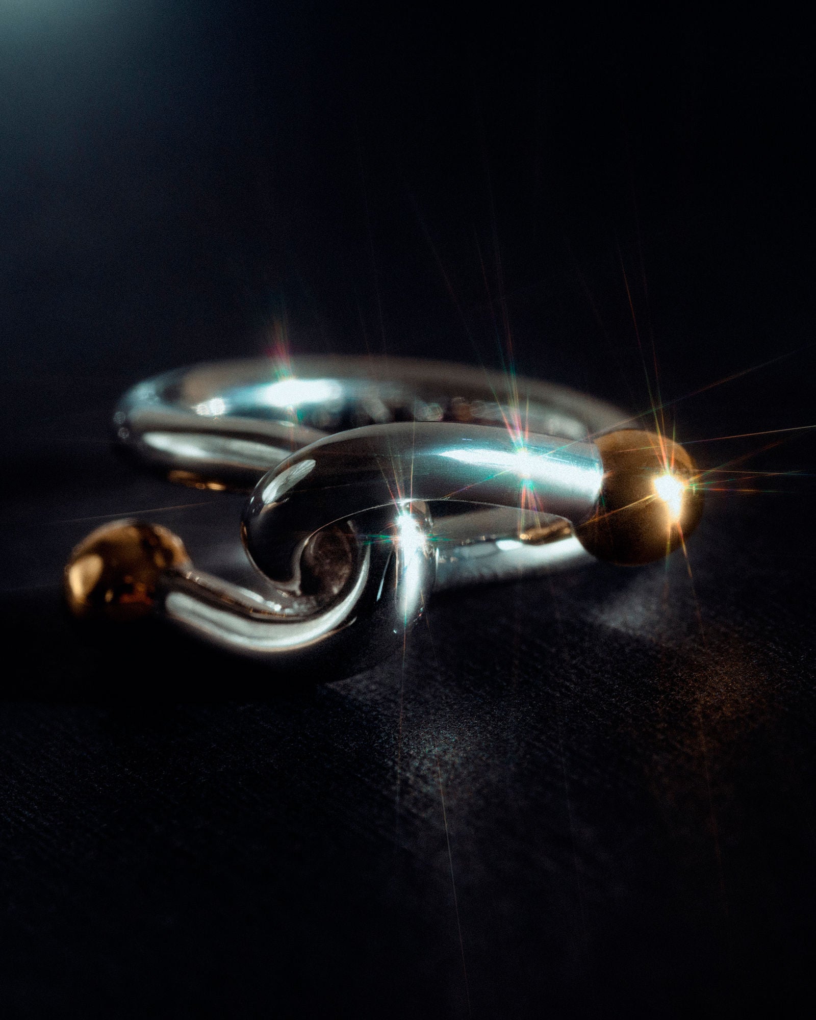 Falcate Rhodium plated Silver Ring
