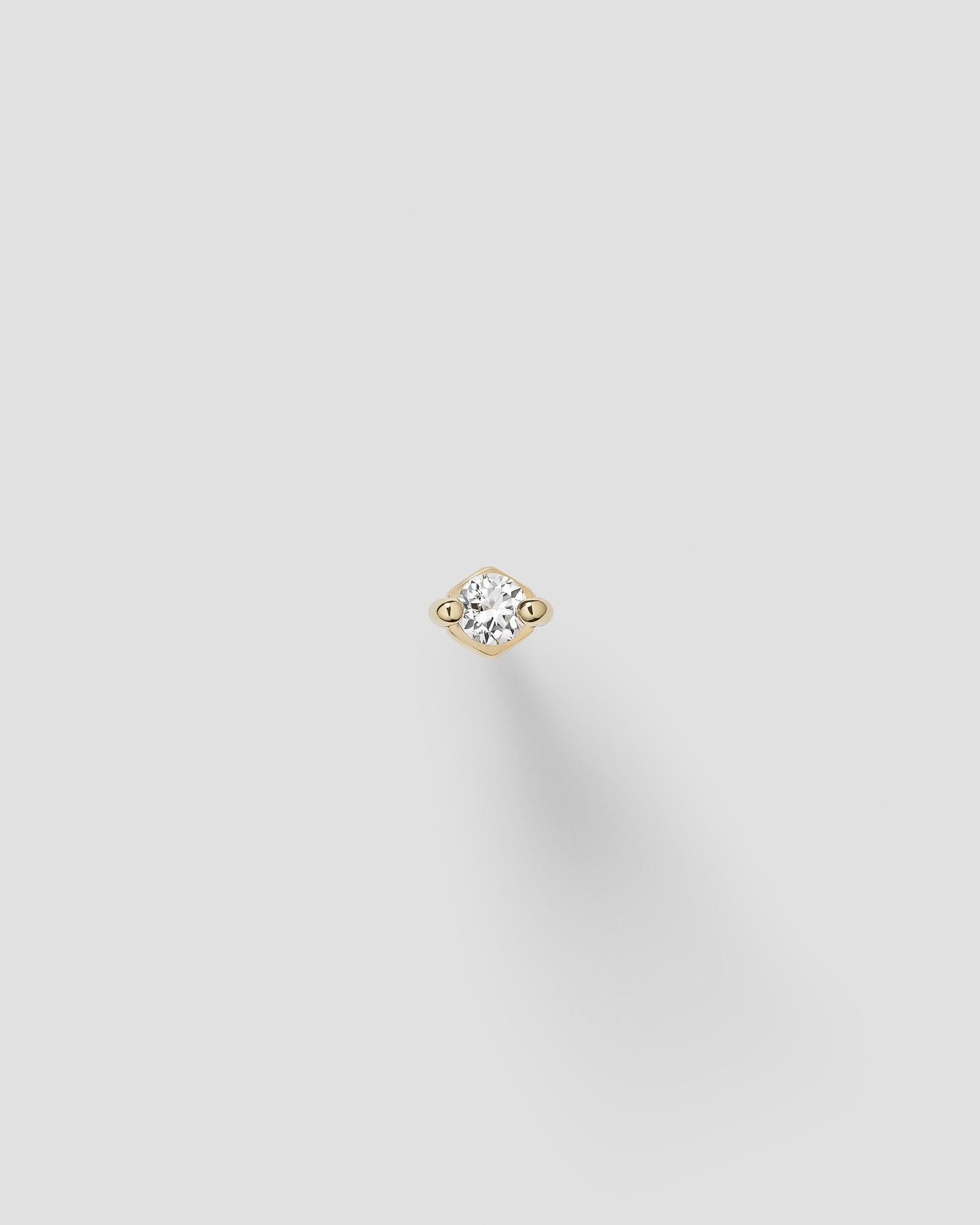 Ivory Labret 14k Gold Ear Piercing w. Diamonds