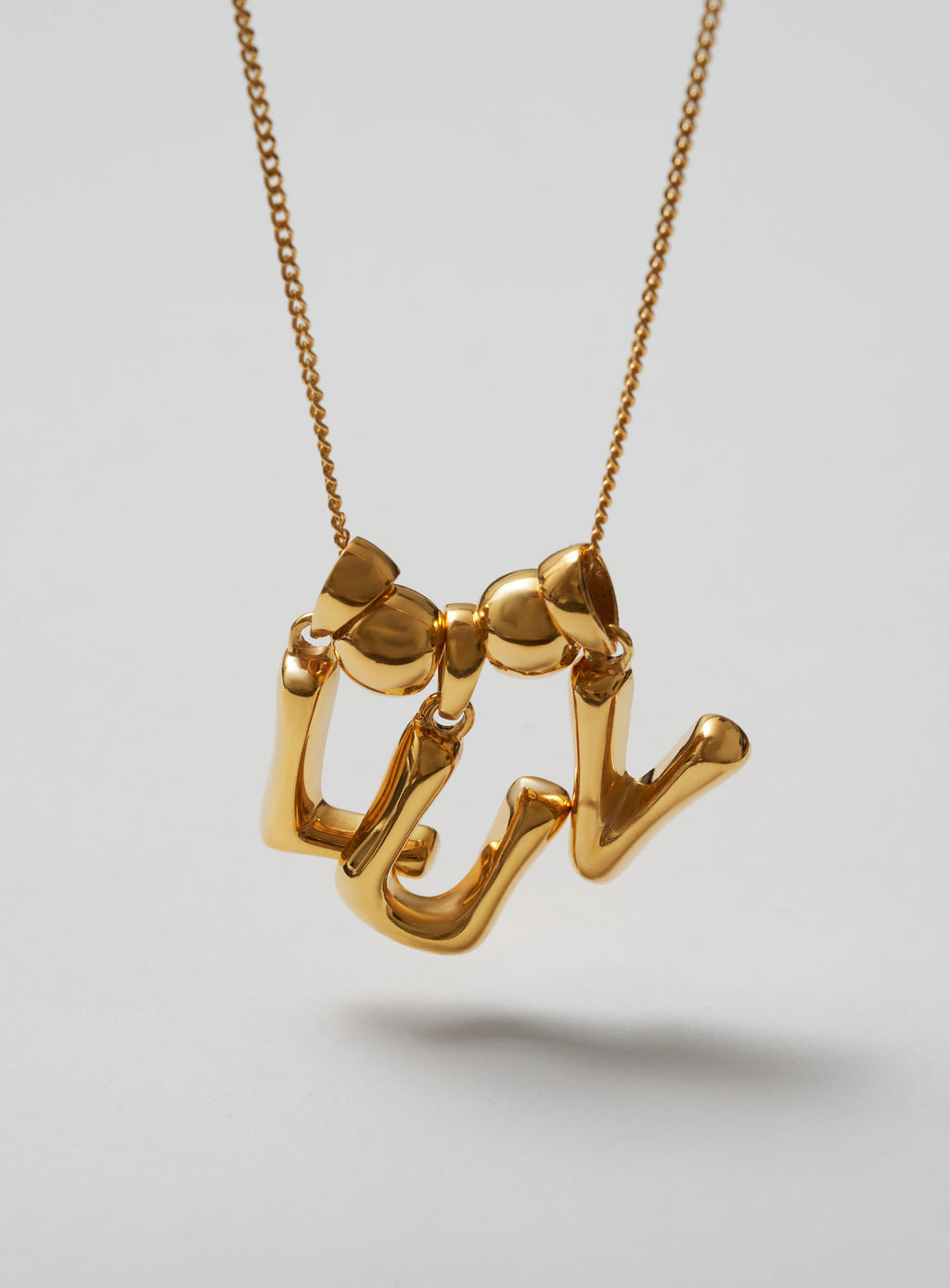 Helium Letter Gold Plated Pendant