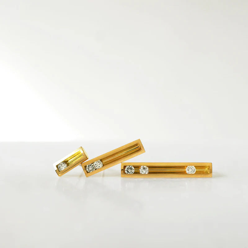 Moving S 18K Gold Ohrring w. Diamant