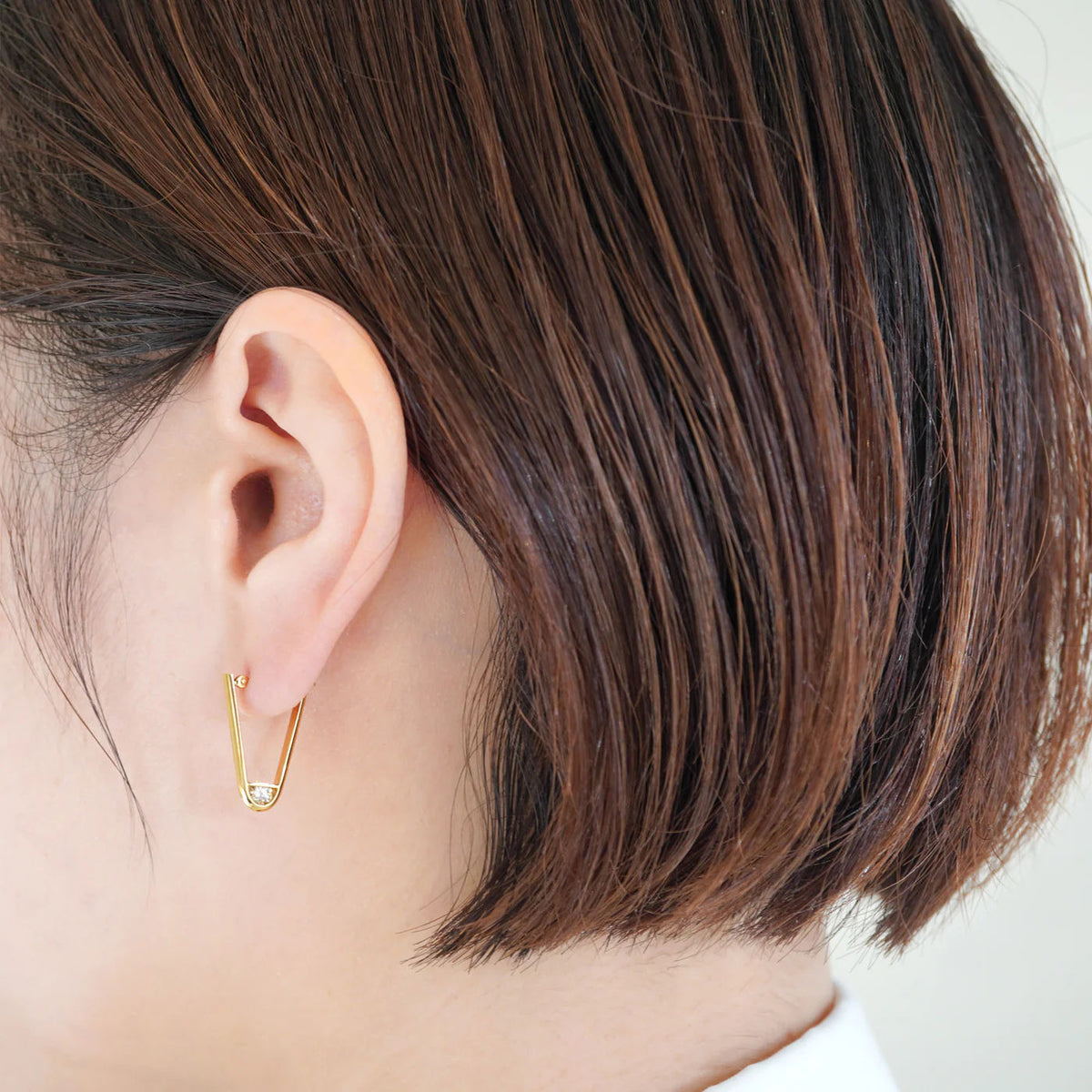 Tipp l 18K Gold Ohrring w. Diamanten