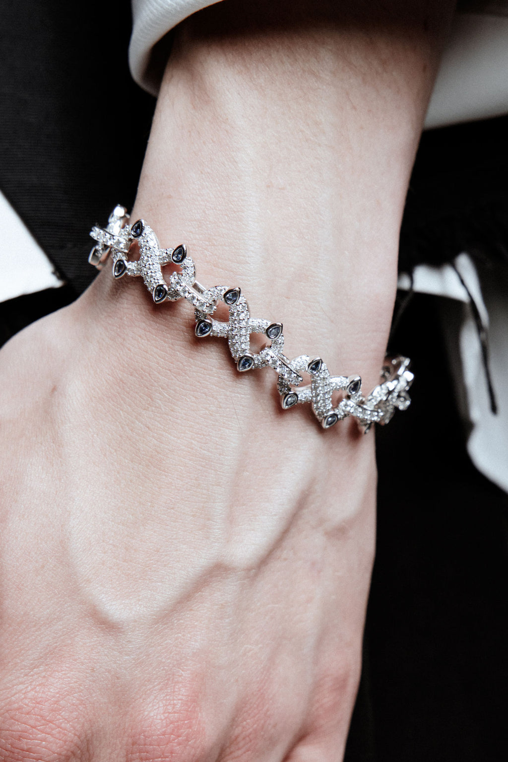 Infinity Rhodium Plated Silver Bracelet w. Moissanites