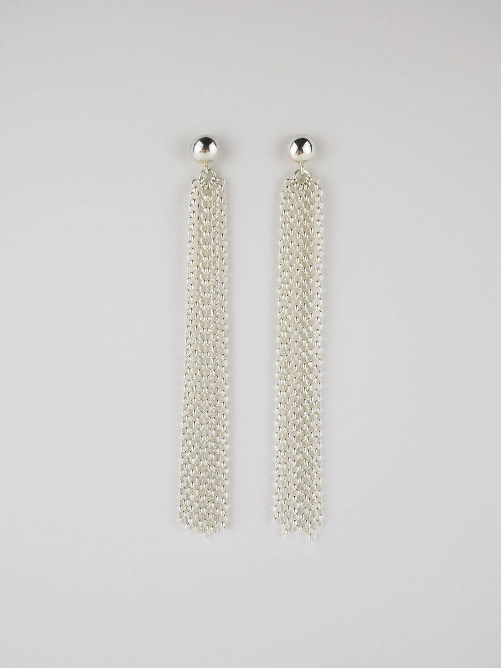Long Pompons Silver Earrings