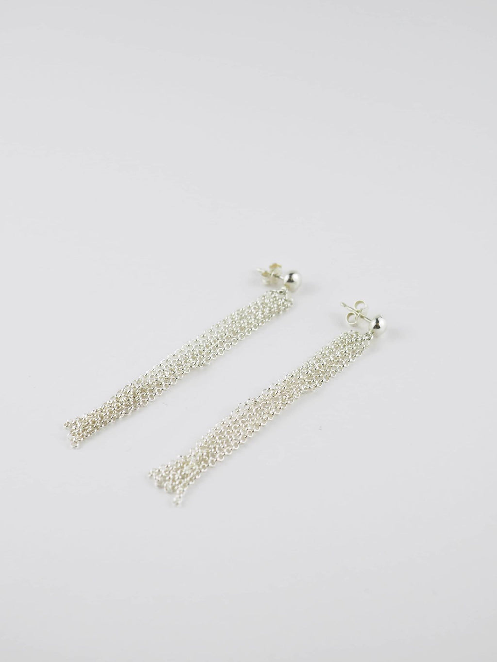 Long Pompons Silver Earrings