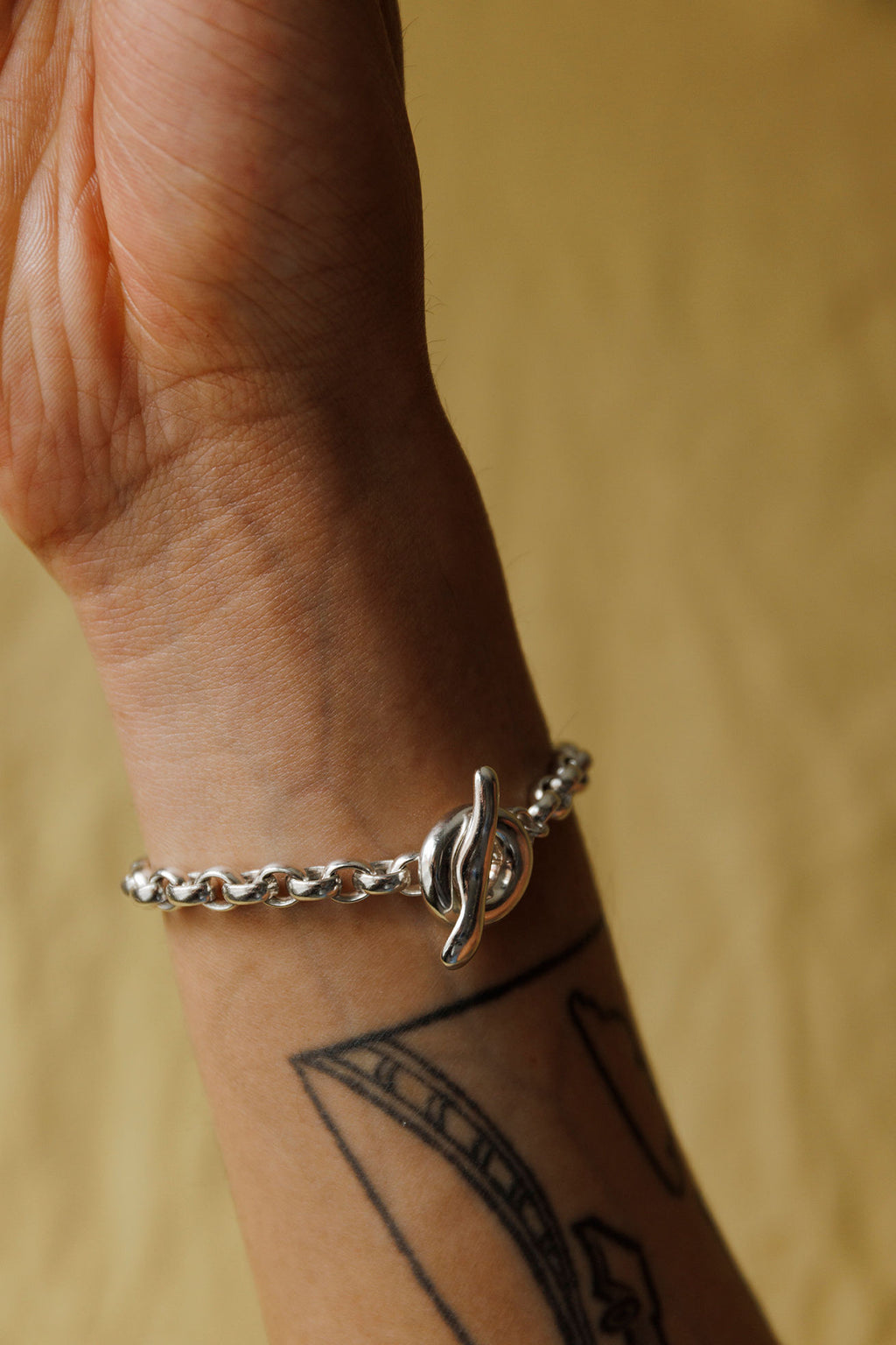 Puka Belcher Silver Bracelet