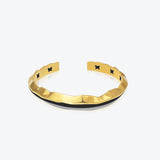 A. Iceberg 18K Gold Plated Cuff w. Jet Black Enamel