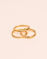 Set of three stacked organic 18K Gold Rings w. Diamonds