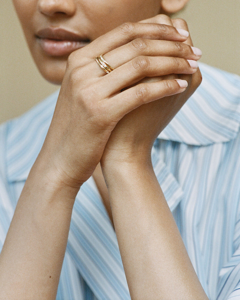 Set of three stacked organic 18K Gold Rings w. Diamonds