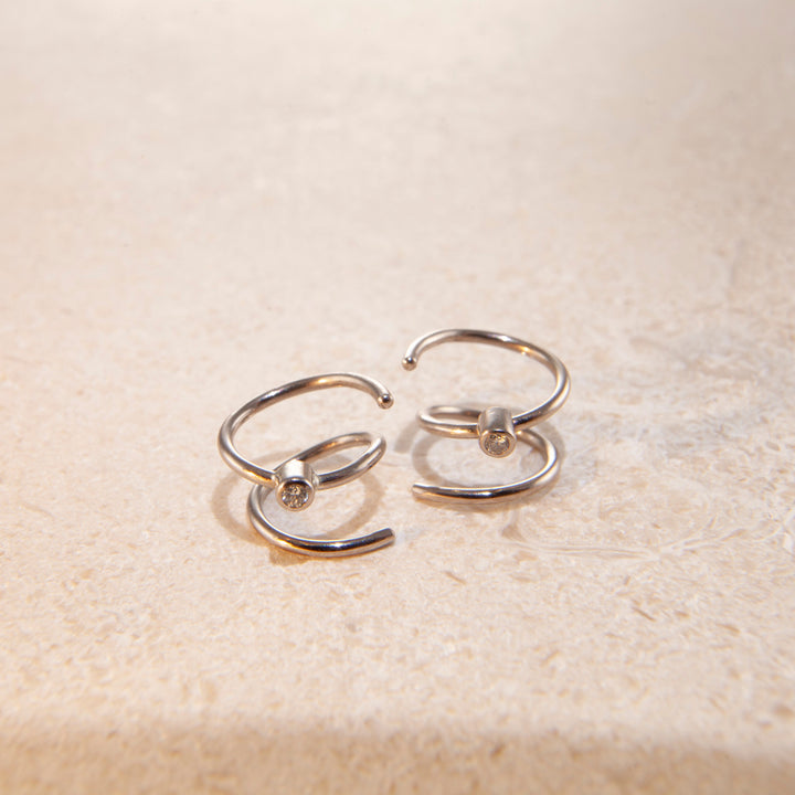 Spiral 18K Whitegold Earrings w. Diamonds