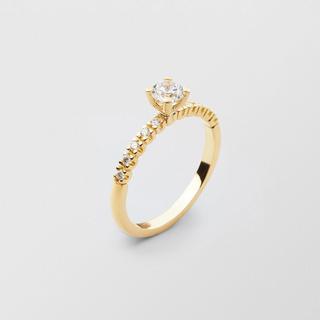 Soft Solitaire 18K Gold Ring w. 0.40 ct and 0.015ct Diamonds