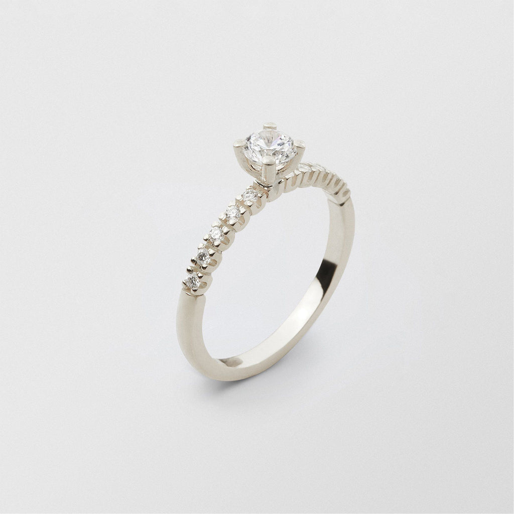 Soft Solitaire 18K Whitegold Ring w. 0.40 ct and 0.015ct Diamonds