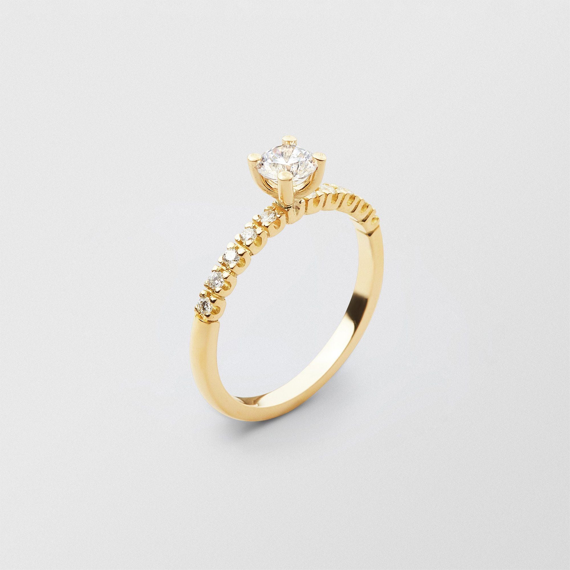 Soft Solitaire 18K Gold Ring w. 0.50 ct and 0.015ct Diamonds