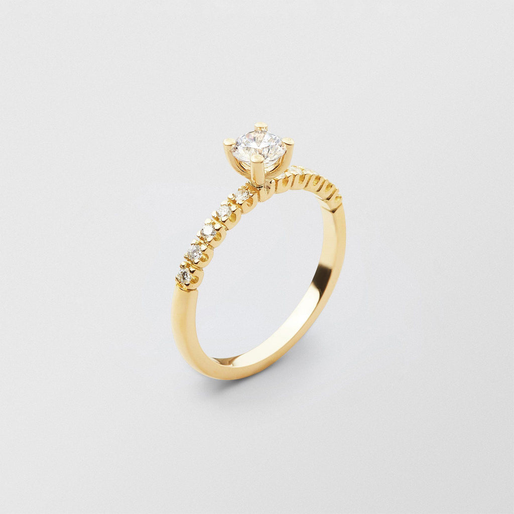 Soft Solitaire 18K Gold Ring w. 0.50 ct and 0.015ct Diamonds