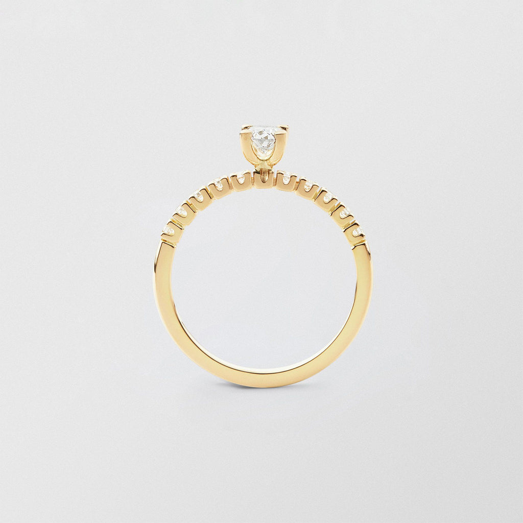 Soft Oval Solitaire 18K Gold Ring w. 0.50 ct and 0.015ct Diamonds