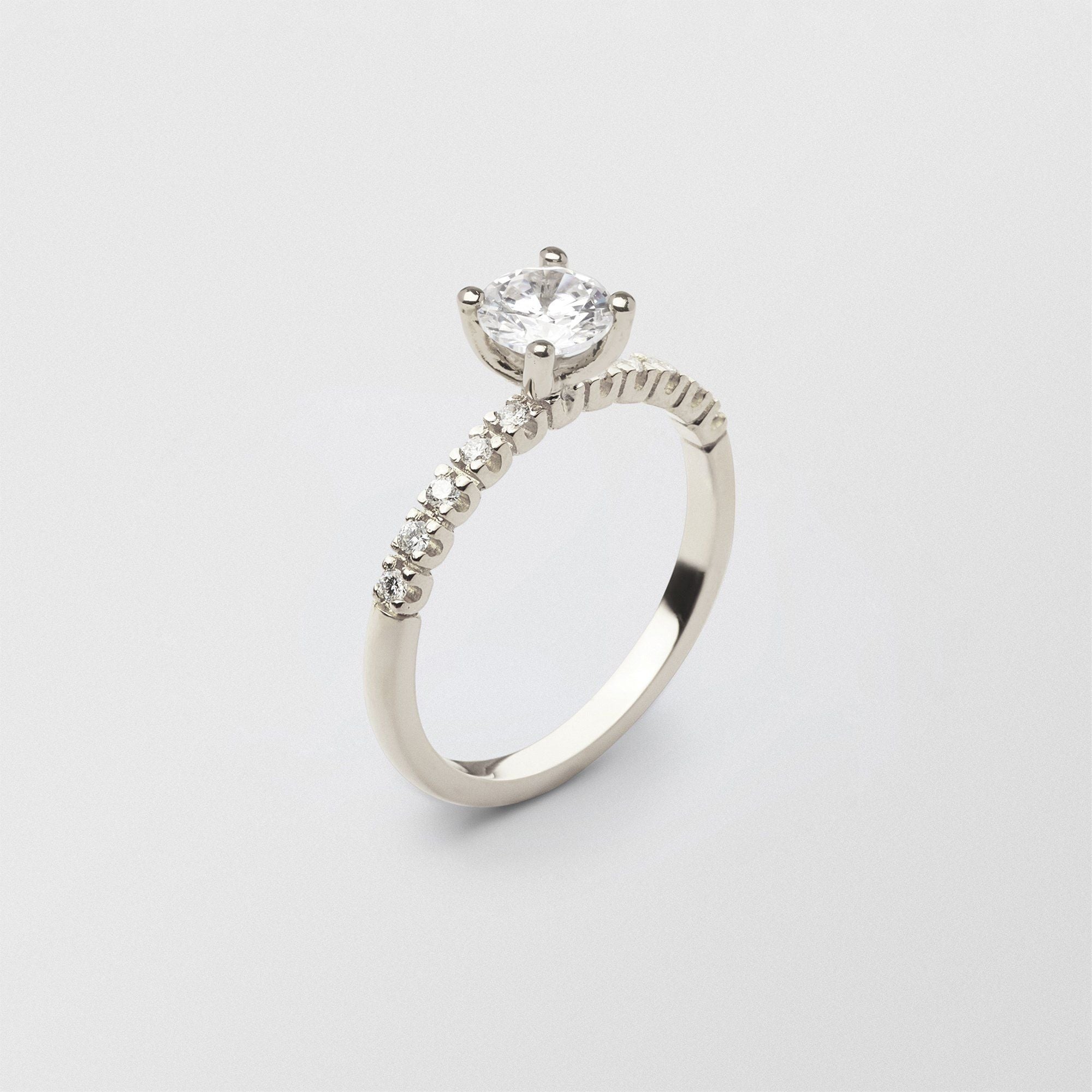 Soft Solitaire 18K Whitegold Ring w. 0.70 ct and 0.015ct Diamonds