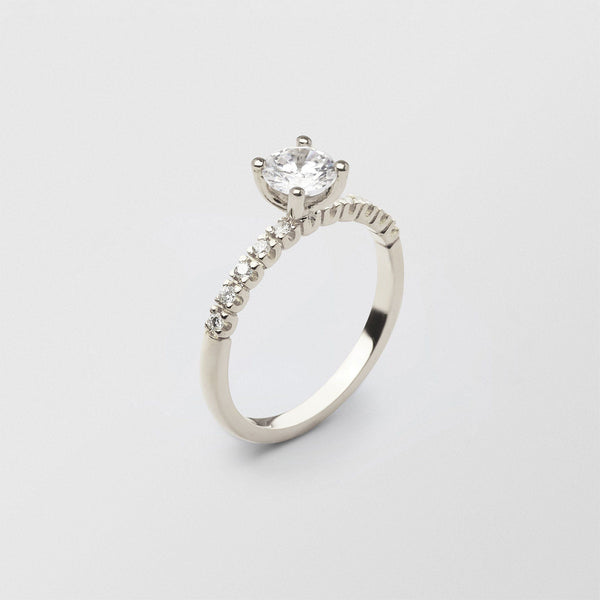 Soft Solitaire 18K Whitegold Ring w. 0.70 ct and 0.015ct Diamonds