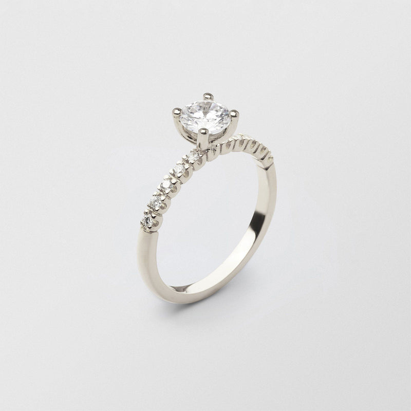 Soft Solitaire 18K Whitegold Ring w. 0.70 ct and 0.015ct Diamonds