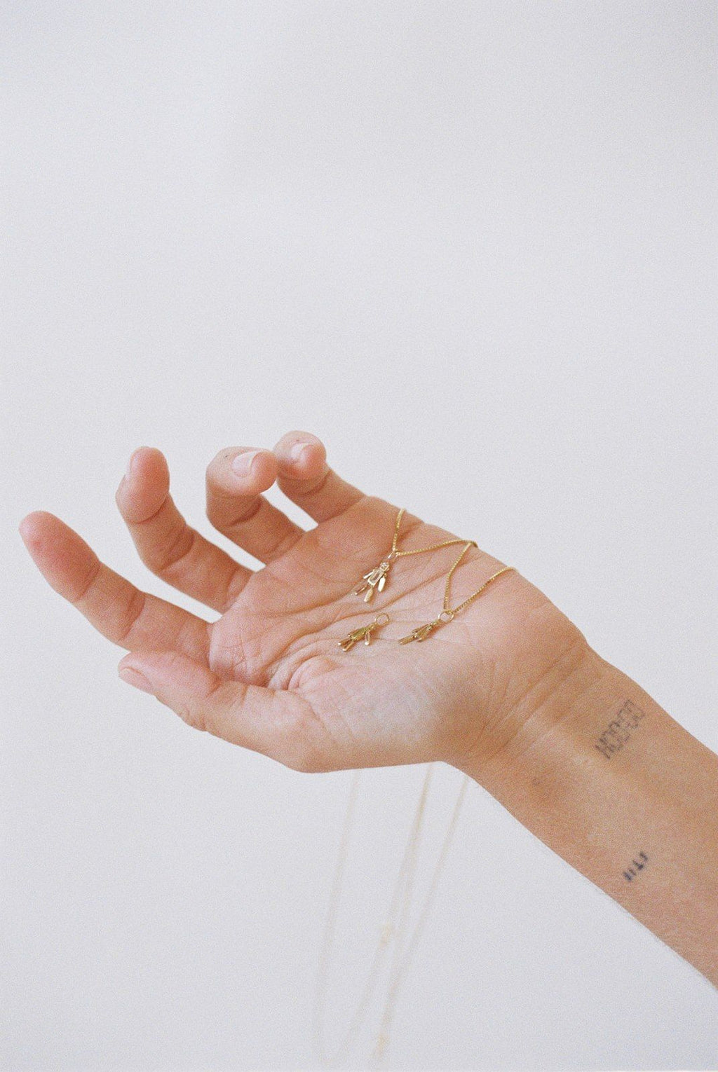 The Friendly Robot 18K Gold Pendant w. Topaz