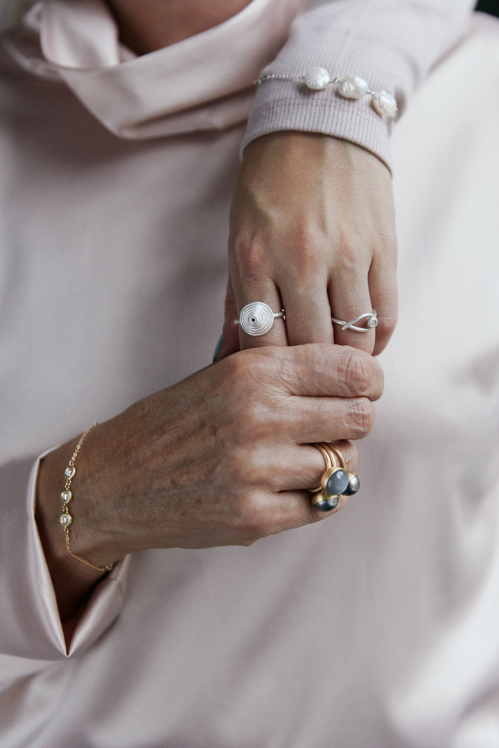 Thera Twist Silver Ring