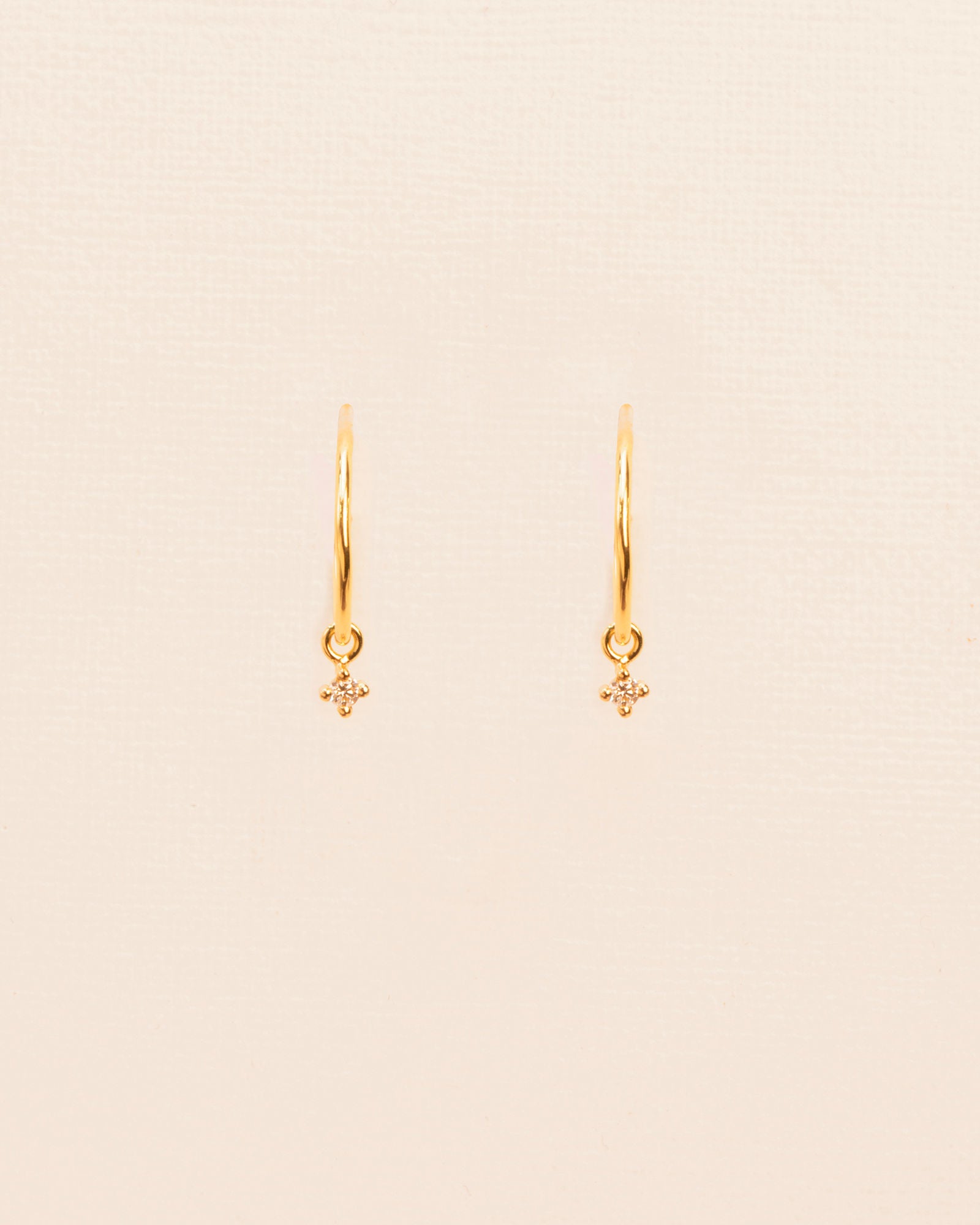 18K Gold Hoops w. dangling white Diamonds