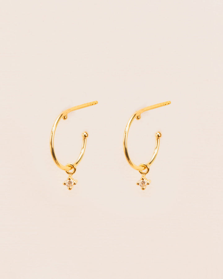 18K Gold Hoops w. dangling white Diamonds