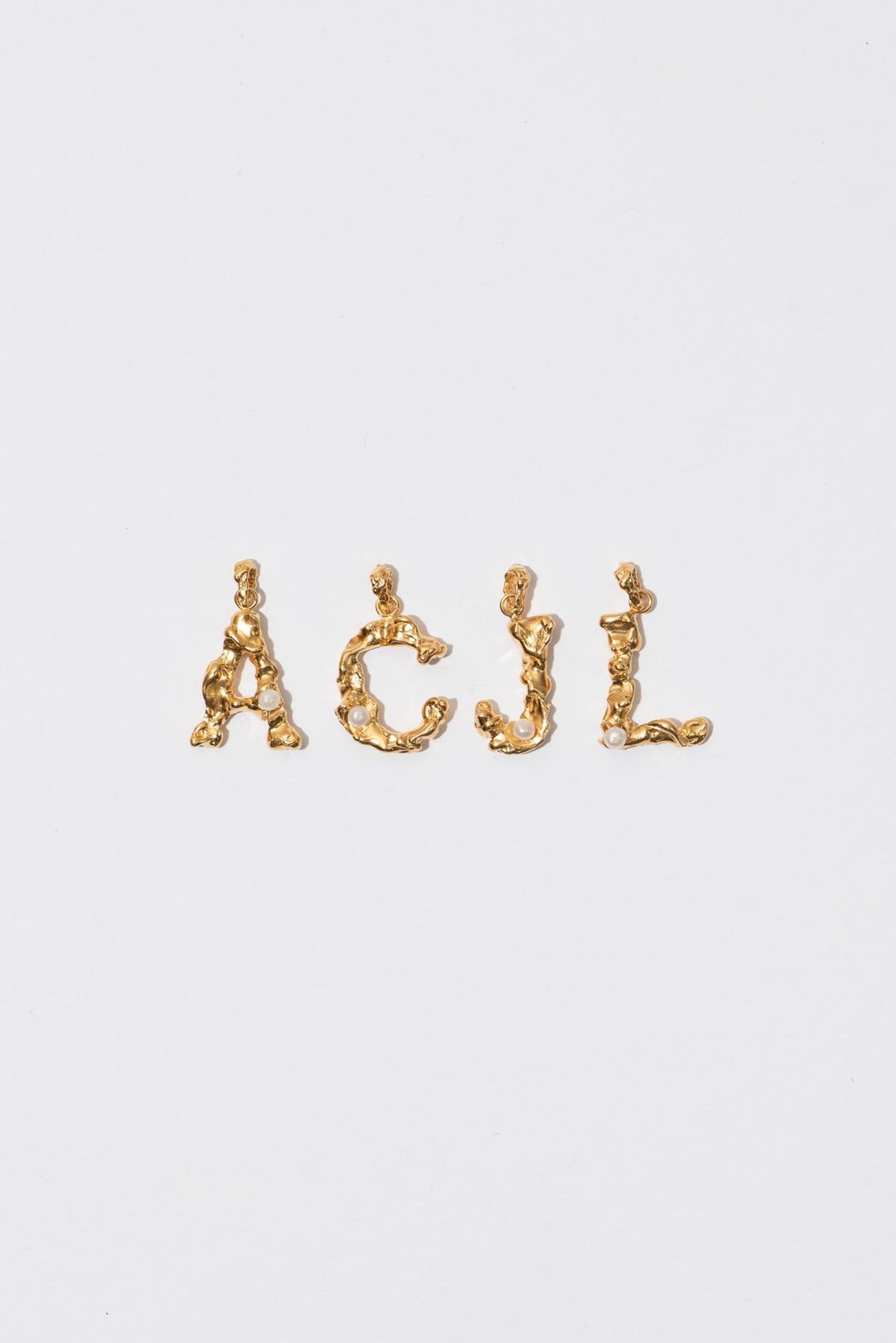 The Pearl Letter Gold Plated Pendant w. Pearl
