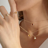 Gems of Cosmo 18K Gold Necklace w. Garnet