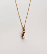 Coralie Grzes | Sofia Amulet of January 18K Gold Necklace w. Garnets